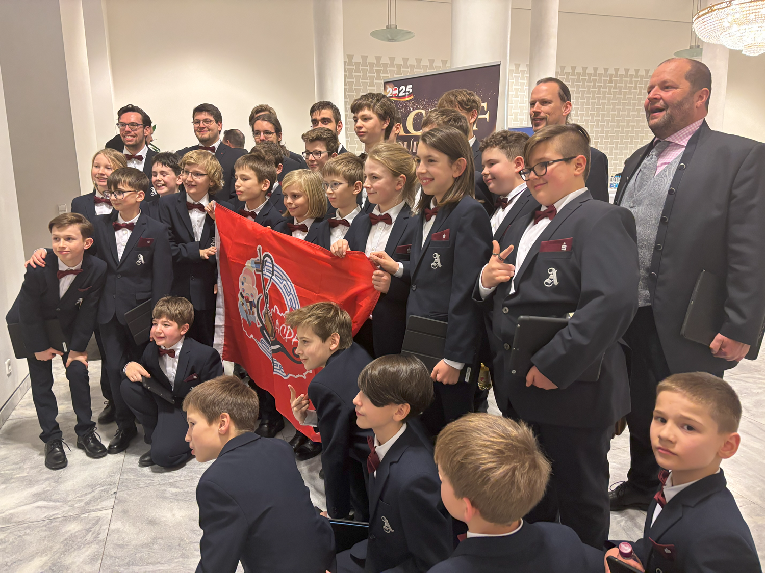 Aurelius Sängerknaben with ACPAF Banner, Feb 2025
